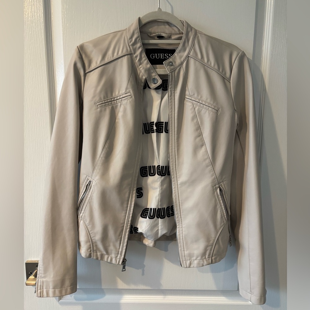 Guess women's  leather jacket . Like new . Size small off white . See video .